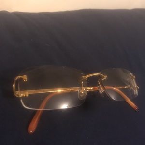 Cartier frame glasses turns into shades